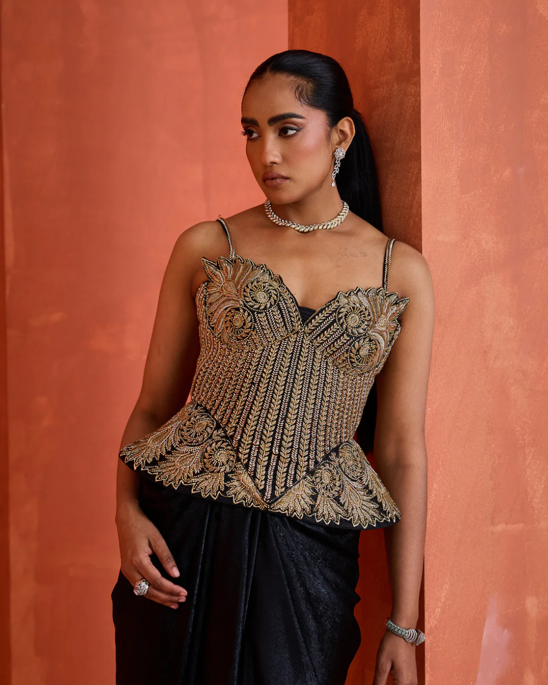 Deepika Chadha - Black drape skirt gold corset From Midnight
