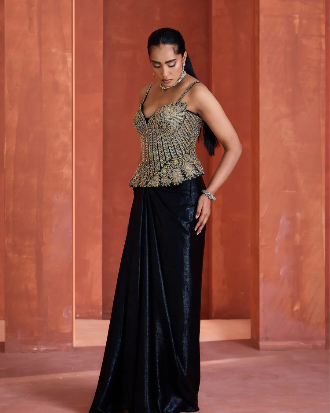 Deepika Chadha - Black drape skirt gold corset From Midnight