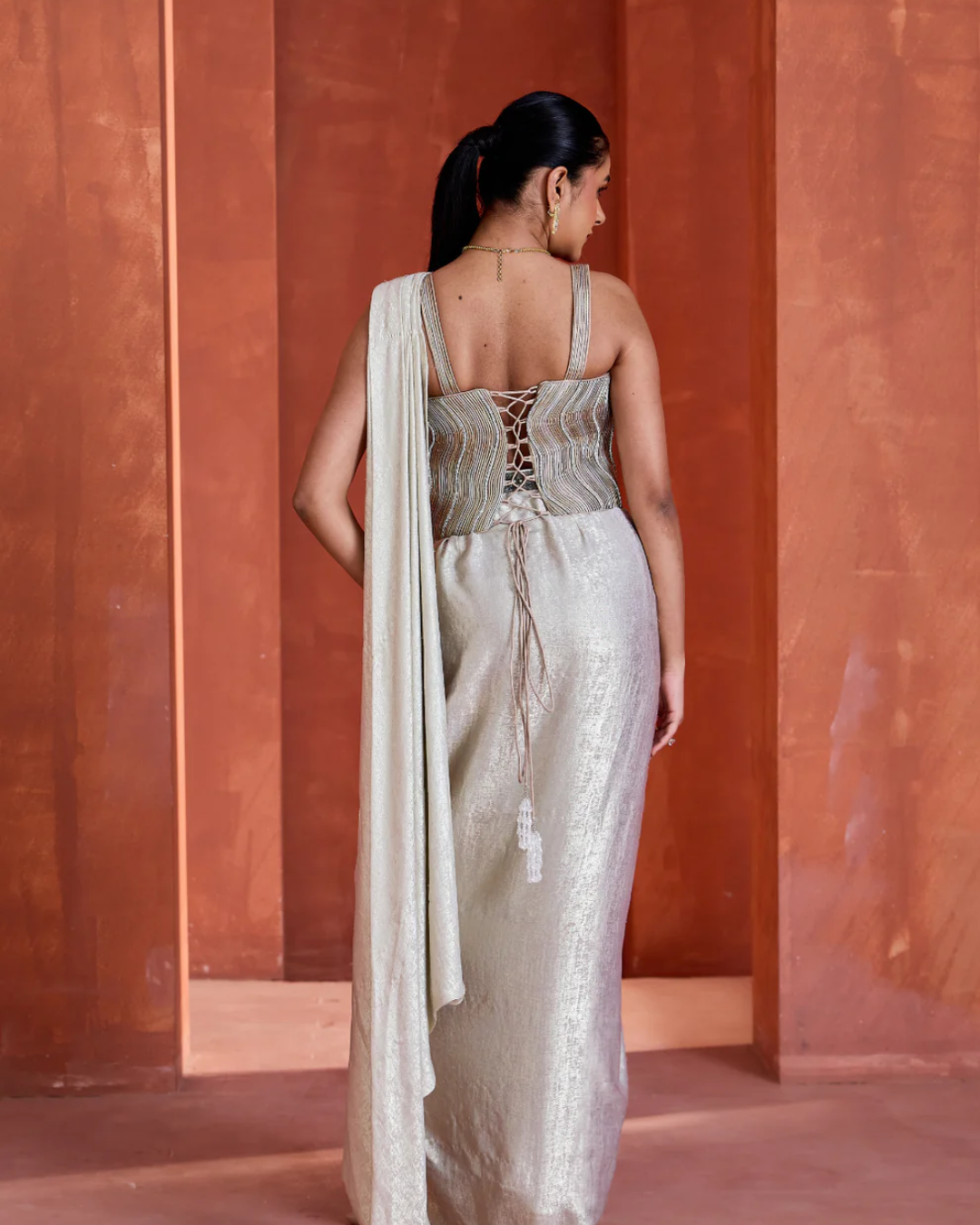 Deepika Chadha - White Corset with drape skirt From Midnight