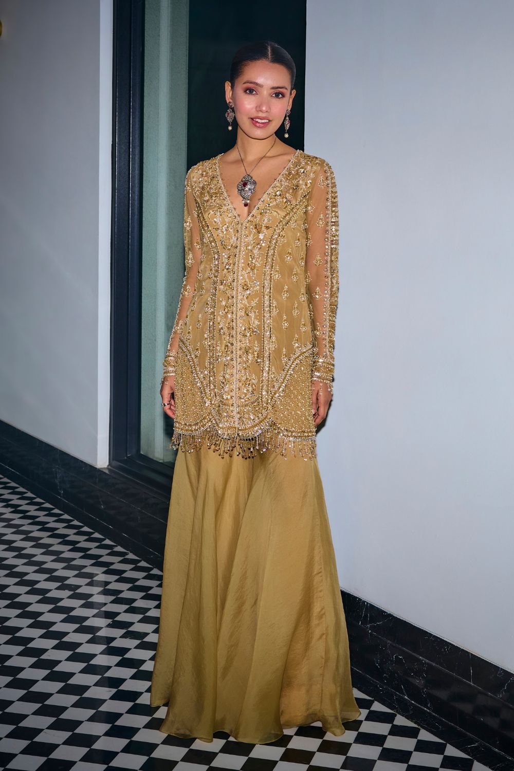 Sanya Gulati - Gold Tonal Embroidered Kurta and Sharara Set from Kia & Kyara
