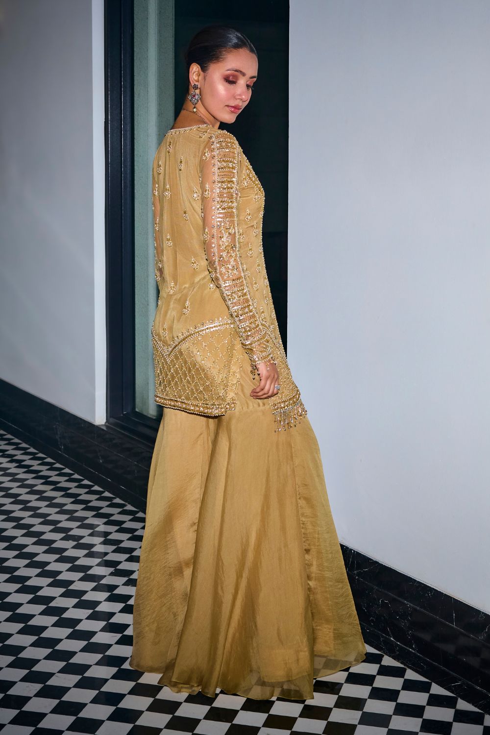 Sanya Gulati - Gold Tonal Embroidered Kurta and Sharara Set from Kia & Kyara
