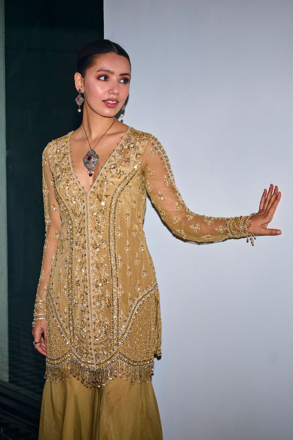 Sanya Gulati - Gold Tonal Embroidered Kurta and Sharara Set from Kia & Kyara