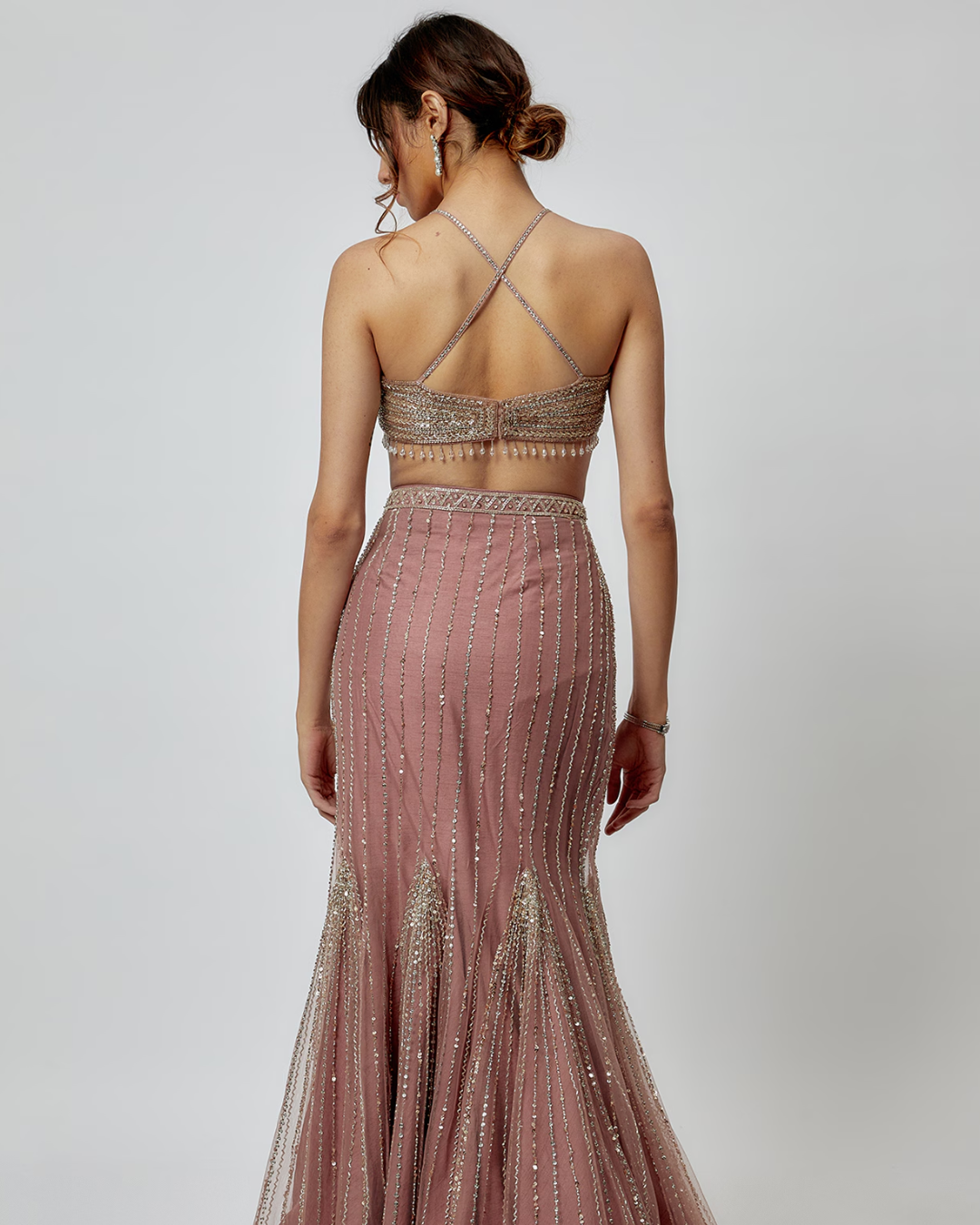 Isa by Dolly Wahal - Champagne Pink Net Embroidered Pre-Draped Saree Set