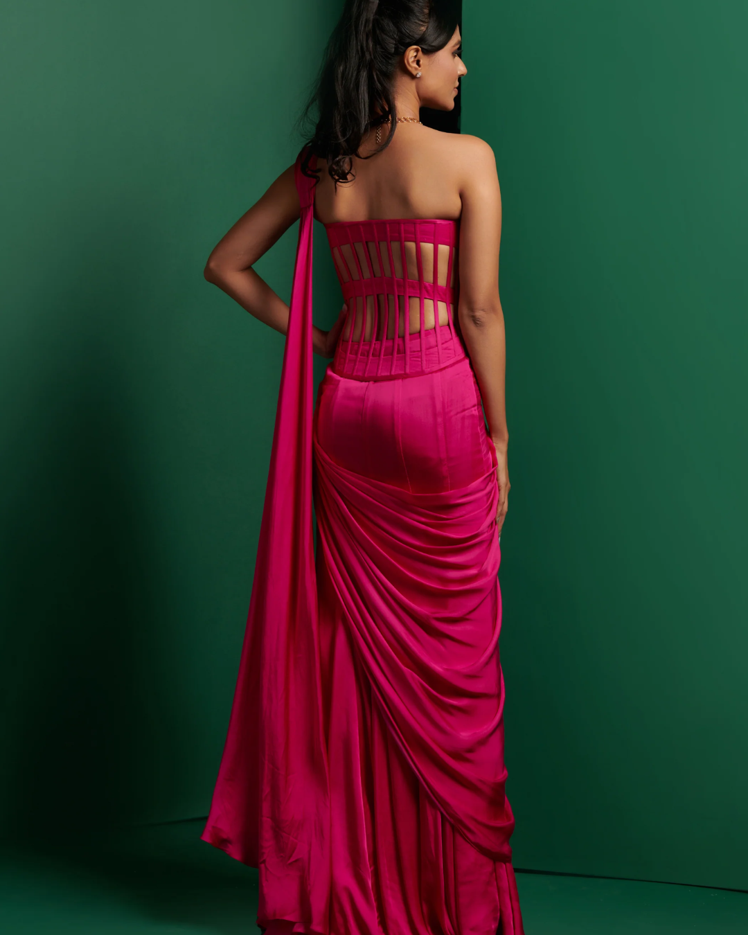 K&A by Karishma and Ashita - Hot pink cage corset and drape From Barre Oblique