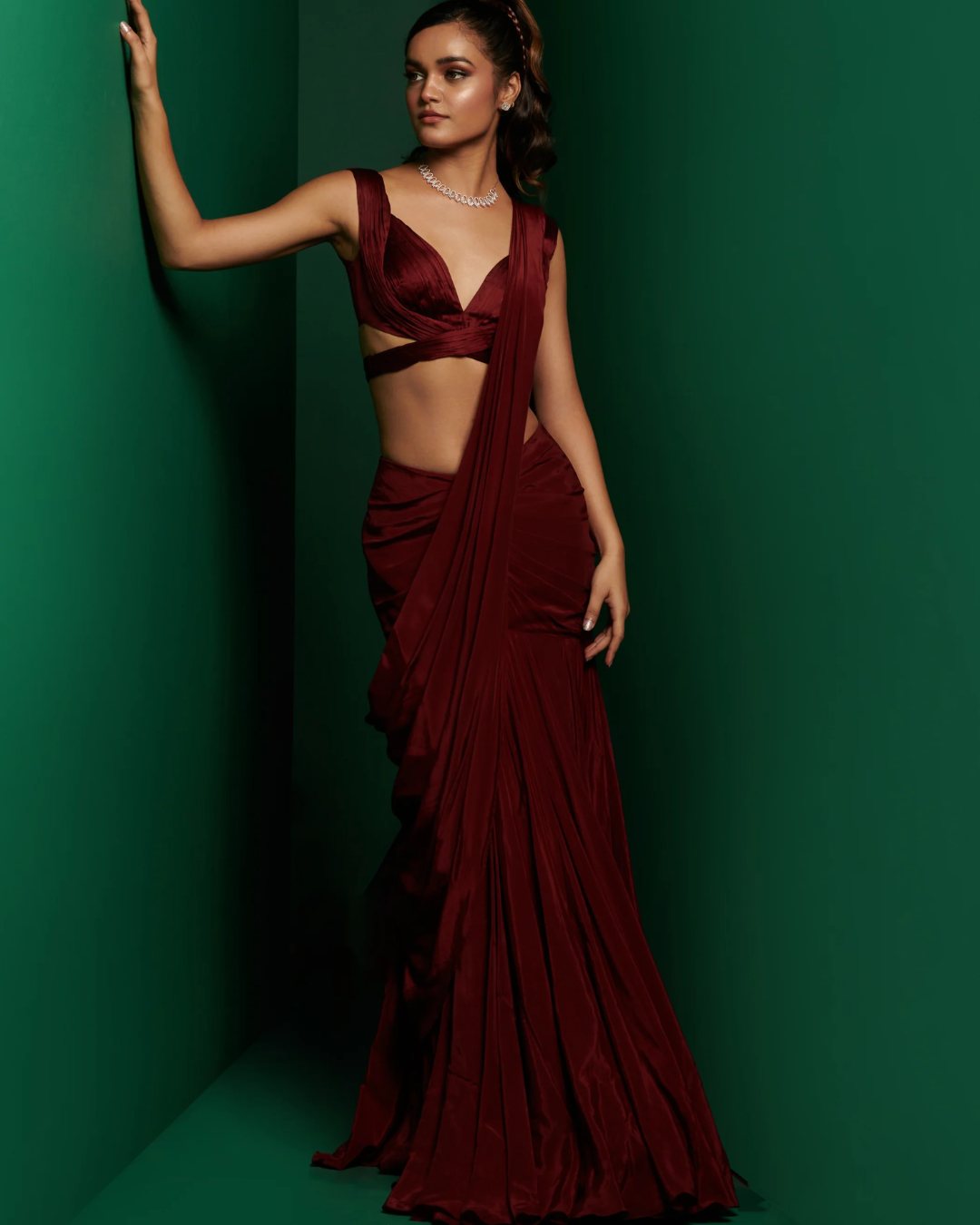 K&A by Karishma and Ashita - Dark maroon cross body blouse with drape saree and embellished cape From Barre Oblique