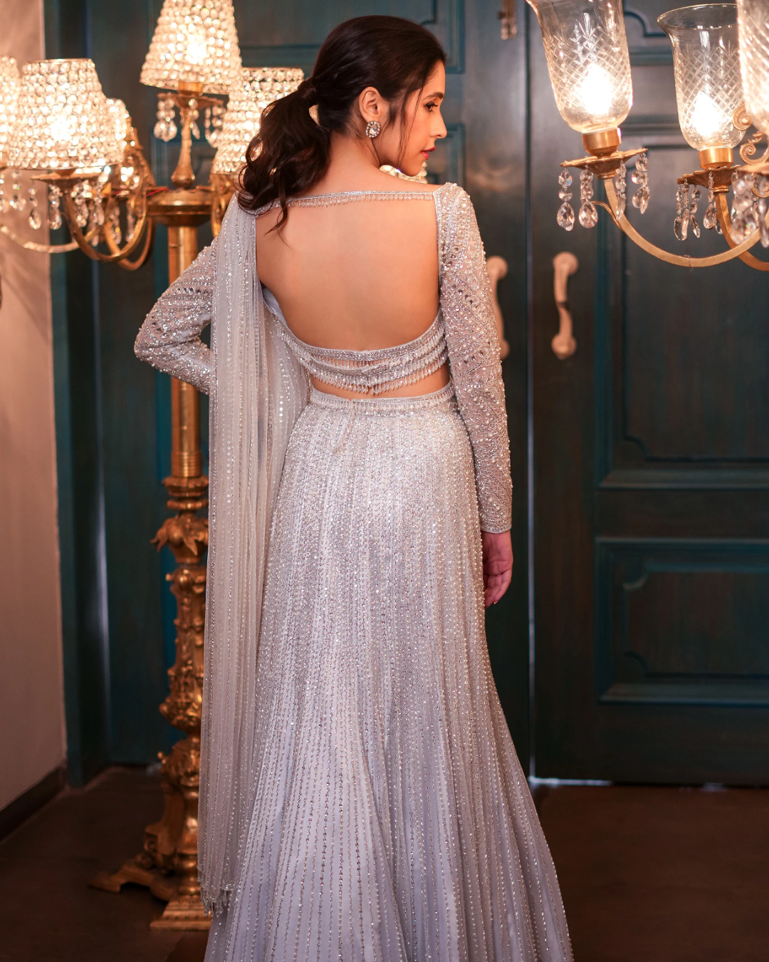Isa by Dolly Wahal - Ice Blue Net Sequins & Crystal Embroidered Pre-Draped Lehenga Saree Set