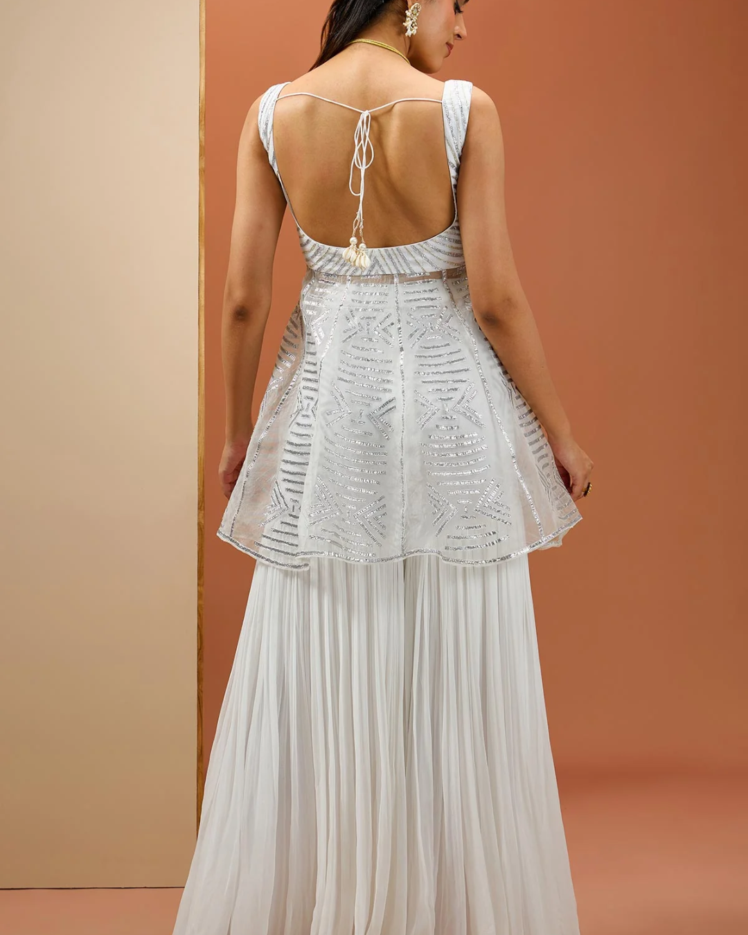 Esha Koul - White Peplum with silver Gota set From Noor