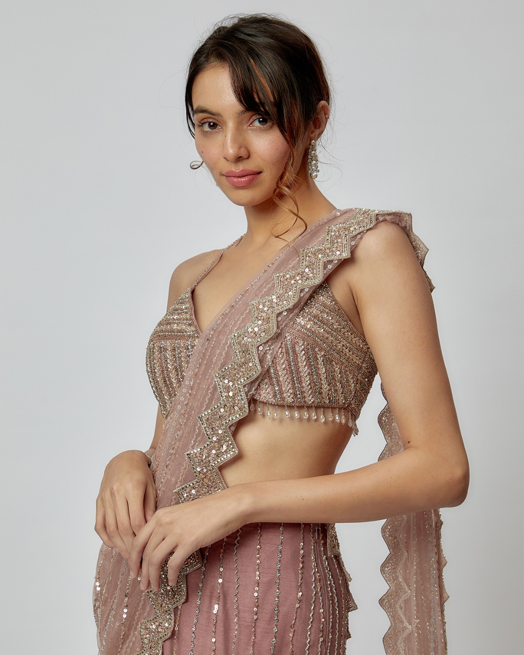 Isa by Dolly Wahal - Champagne Pink Net Embroidered Pre-Draped Saree Set