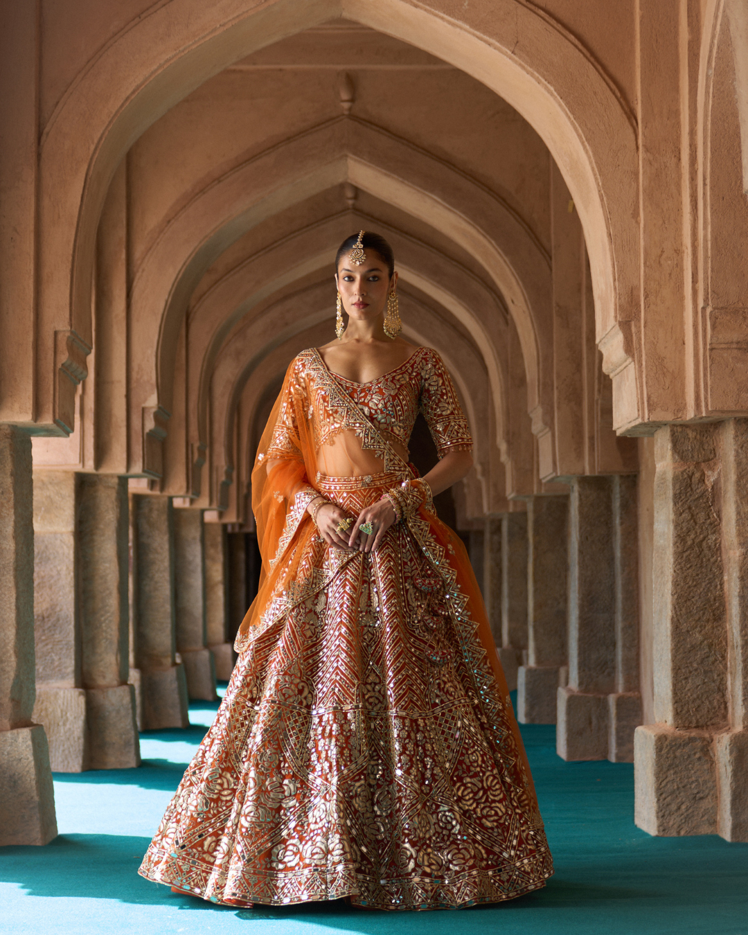 Angad Singh - TEJ — Rust Orange Organza Lehenga Set From Zariya