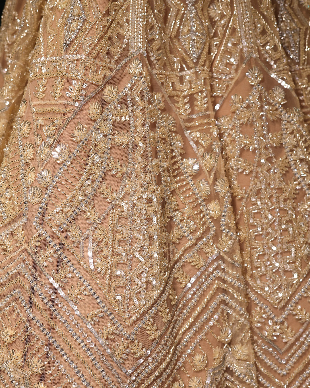 Isa by Dolly Wahal - Light Gold Net Sequins Embroidered Lehenga Set