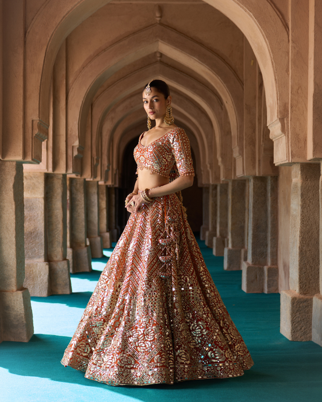 Angad Singh - TEJ — Rust Orange Organza Lehenga Set From Zariya