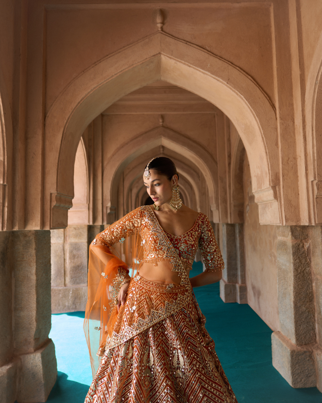 Angad Singh - TEJ — Rust Orange Organza Lehenga Set From Zariya