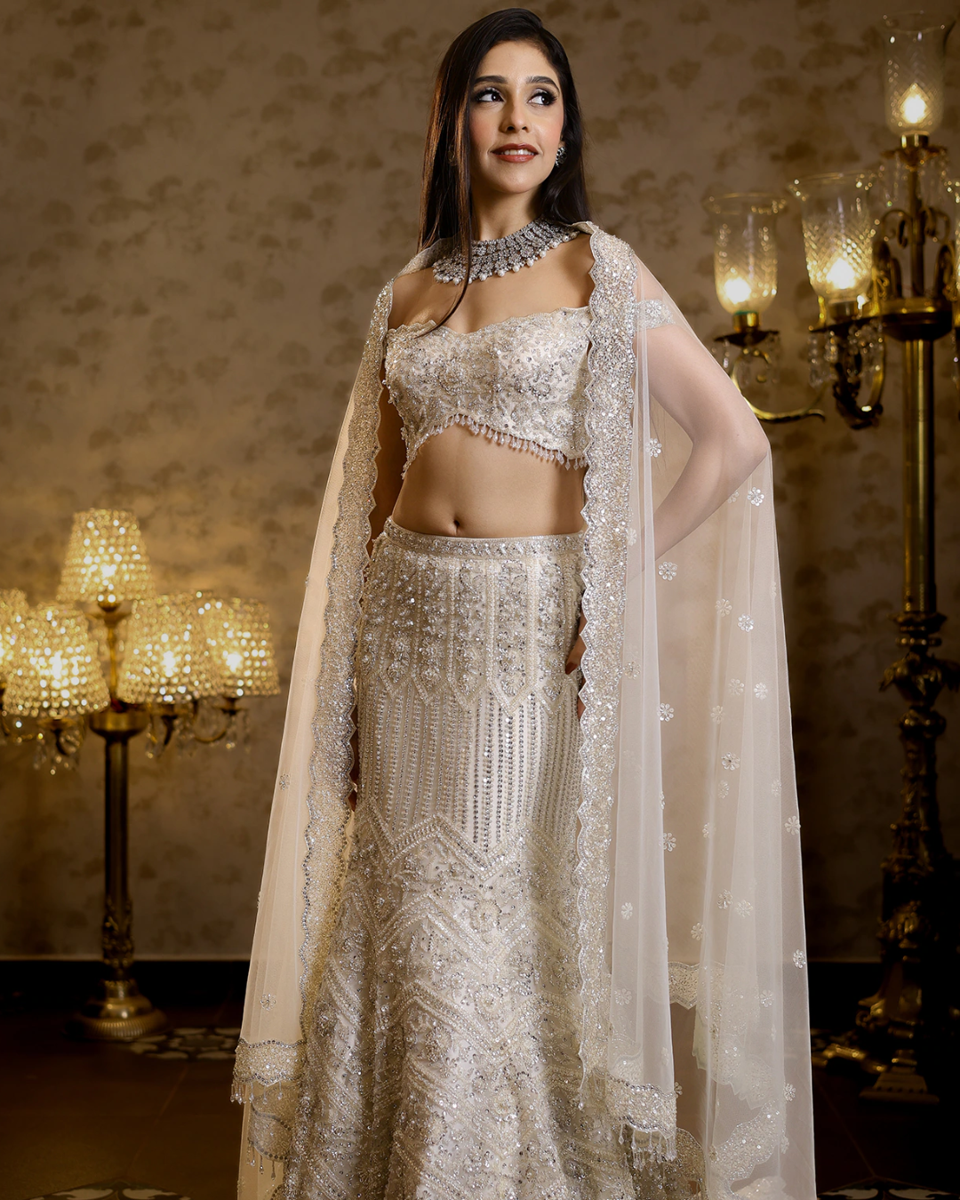 Isa by Dolly Wahal - Ivory Net Hand Embroidered Fish-Cut Lehenga Set