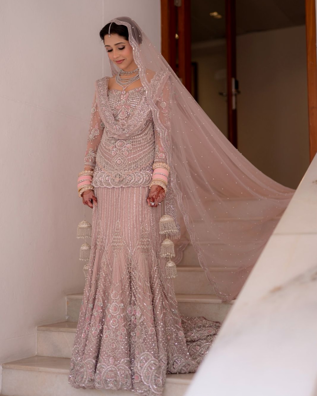 Isa by Dolly Wahal - Blush Pink Bridal Lehenga From Ittara