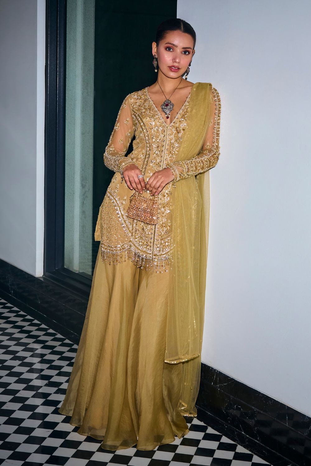 Sanya Gulati - Gold Tonal Embroidered Kurta and Sharara Set from Kia & Kyara