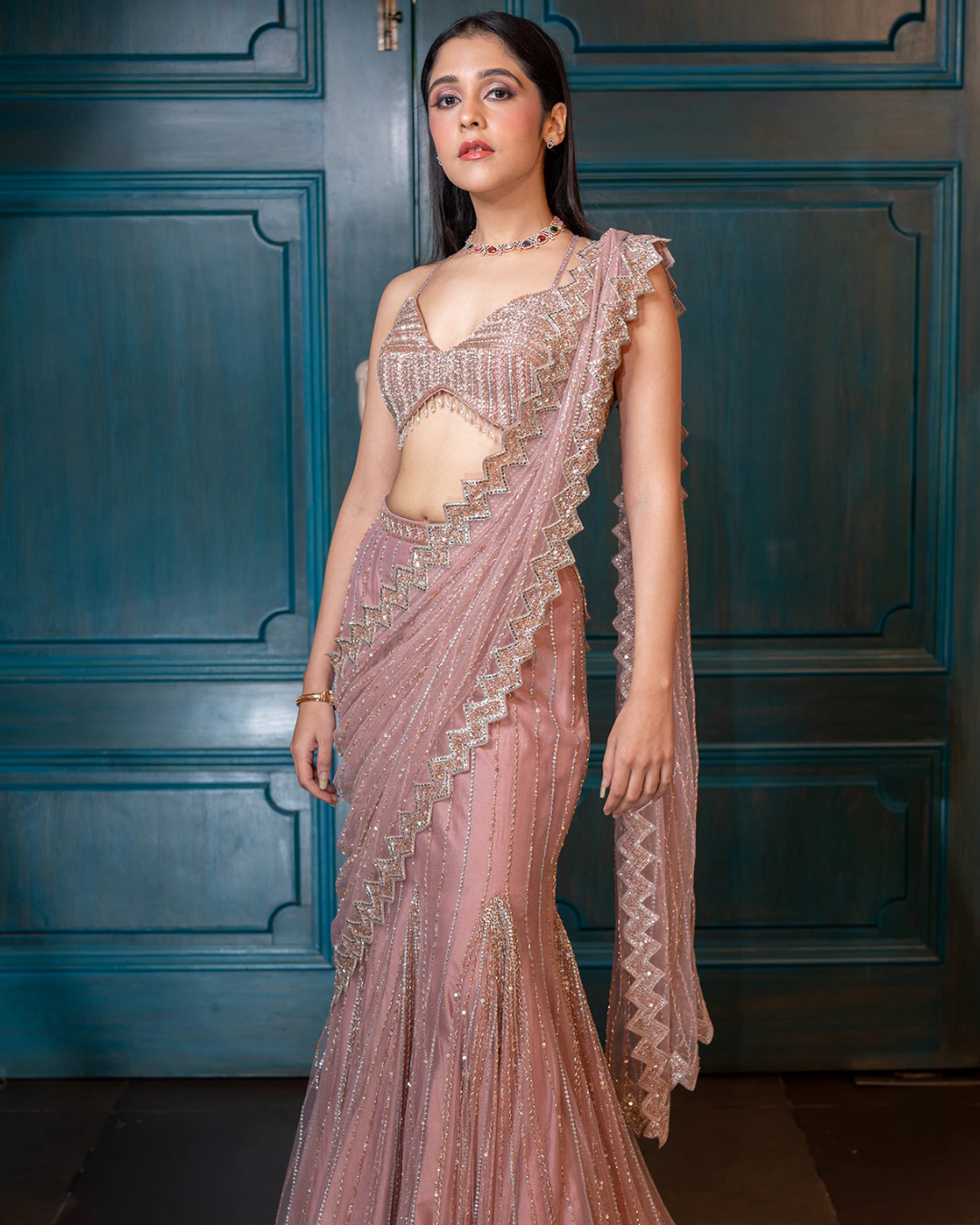 Isa by Dolly Wahal - Champagne Pink Net Embroidered Pre-Draped Saree Set