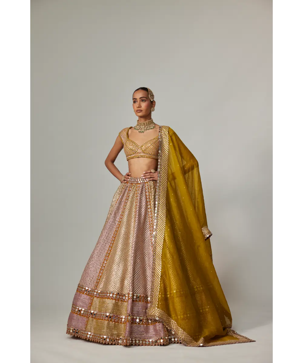 VVANI VATS - Mustard multicolor Heavy Metallic Lehenga with green Dupatta