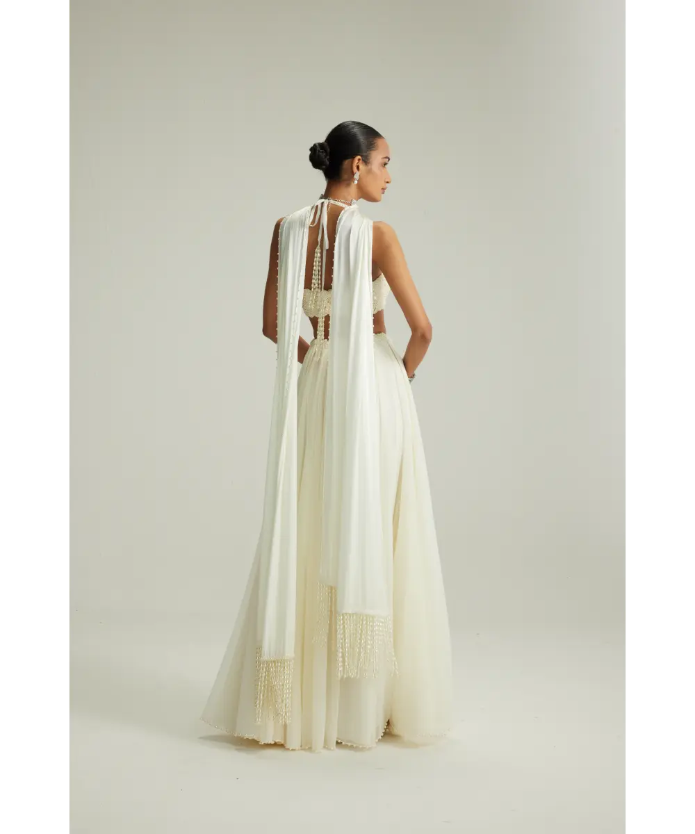 Off White Skirt Set With Halter Neck Blouse