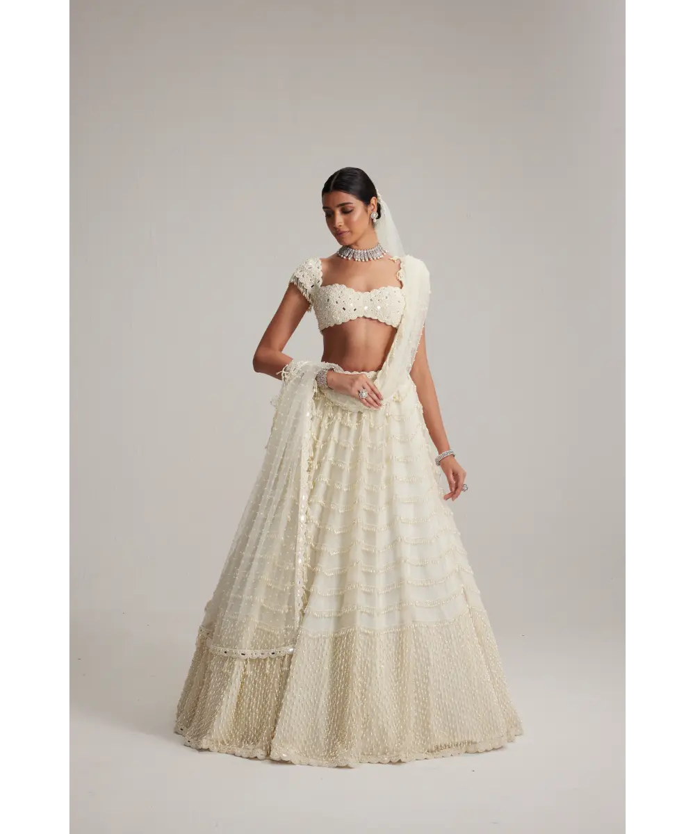 VVANI VATS- Off White Mirror and Pearl Drop Bridal lehenga set with Veil