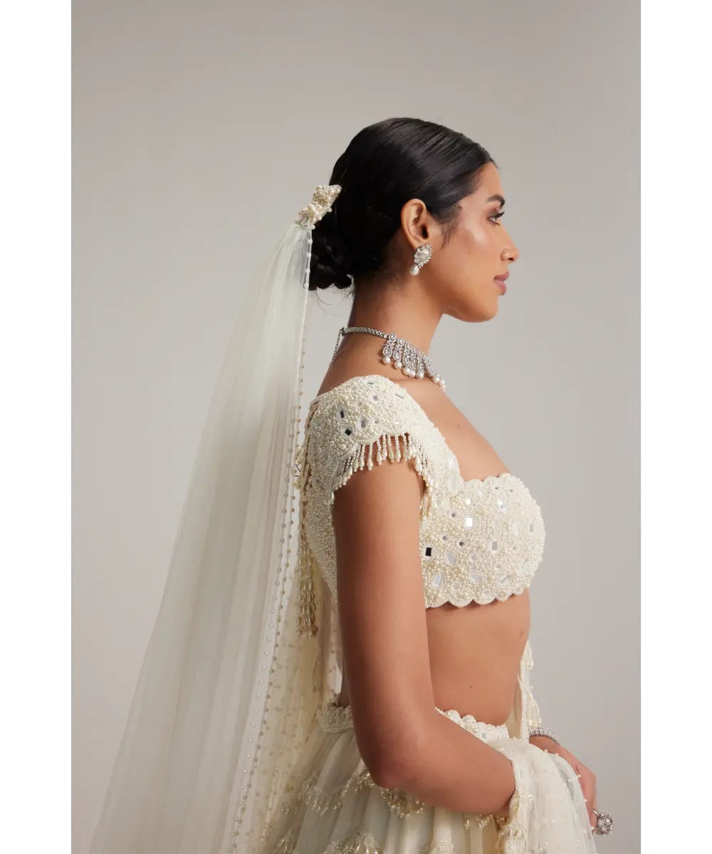 VVANI VATS- Off White Mirror and Pearl Drop Bridal lehenga set with Veil