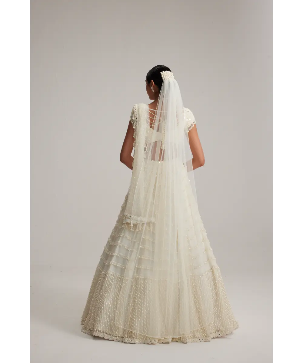 VVANI VATS- Off White Mirror and Pearl Drop Bridal lehenga set with Veil
