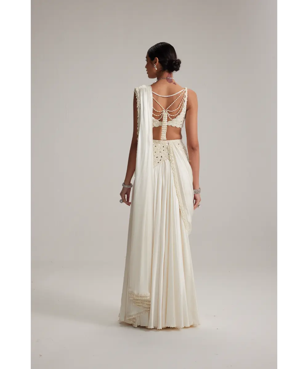 VVANI VATS- Off White Pearl and Mirror Embroidered satin draped saree set