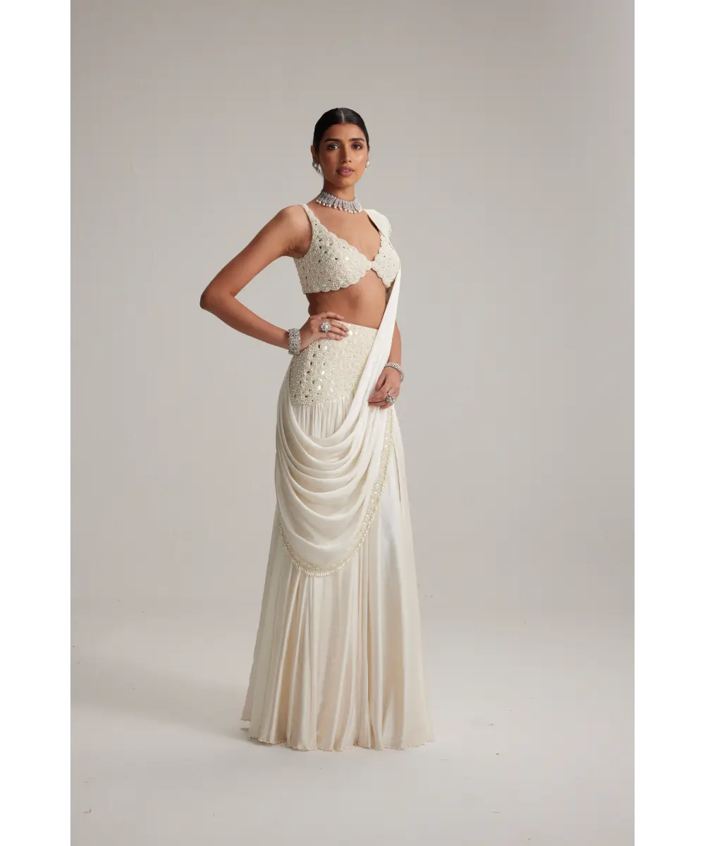 VVANI VATS- Off White Pearl and Mirror Embroidered satin draped saree set