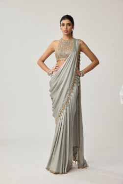 VVANI VATS - Powder Grey Mirror Satin Saree Set