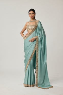 VVANI VATS - Powder Blue Mirror Satin Saree Set