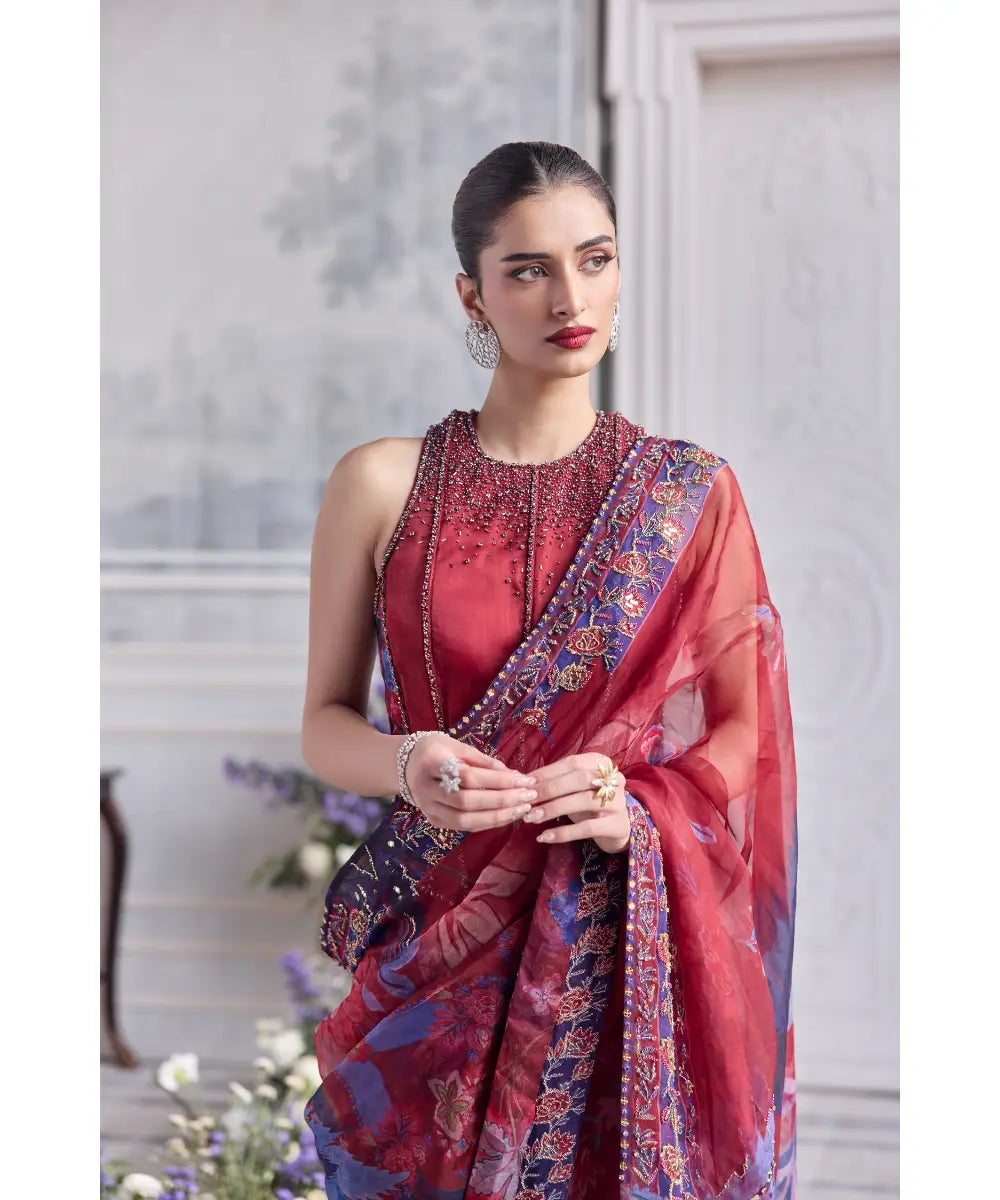 EMBROIDERED RACER BACK CORSET PAIRED WITH EMBRODIERED PREDRAPED SAREE - FARISHA