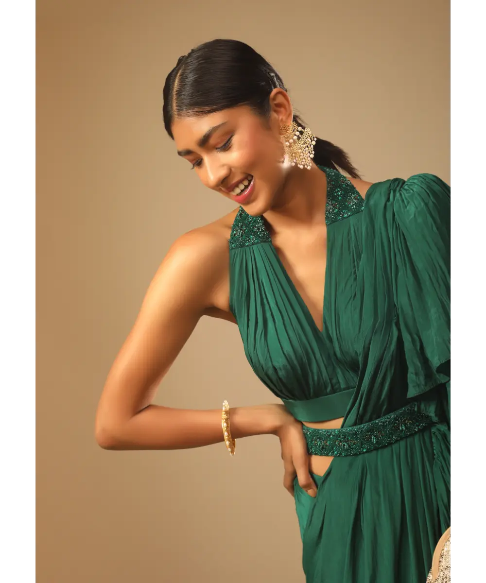 KALKI - Emerald Green Ready Pleated Ruffle Saree With A Halter Neck Blouse And 3D Embroidered Belt