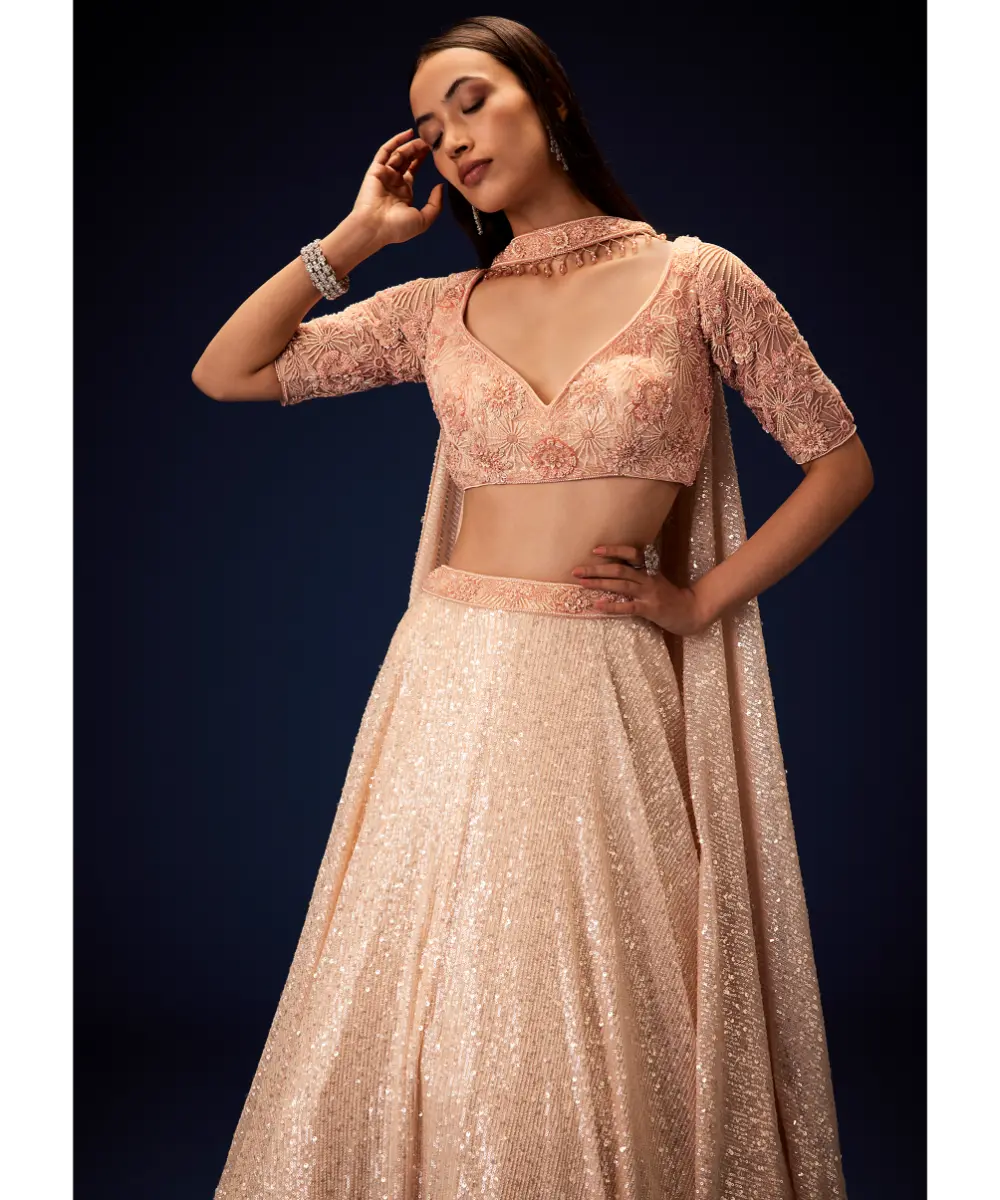KALKI - Salmon Peach Hand Embroidered Double Layer Sequence Lehenga With Frill