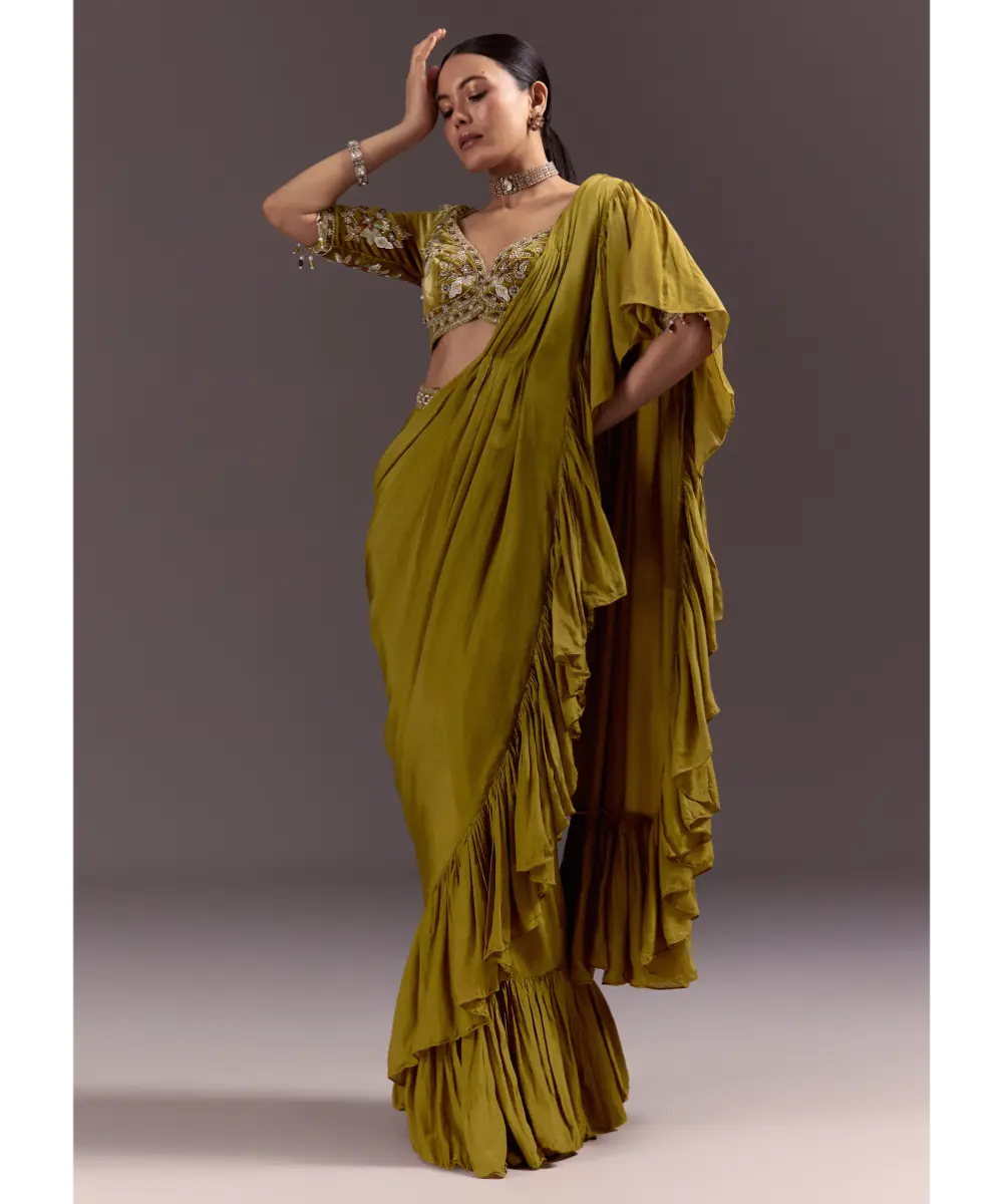 KALKI - Olive Green Velvet Saree With Frilled Pallu And Heavy Embroidered Blouse