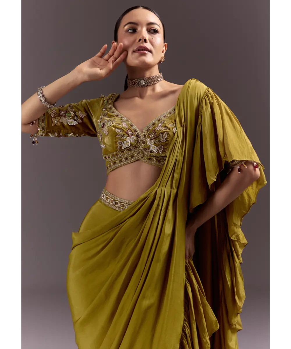 KALKI - Olive Green Velvet Saree With Frilled Pallu And Heavy Embroidered Blouse