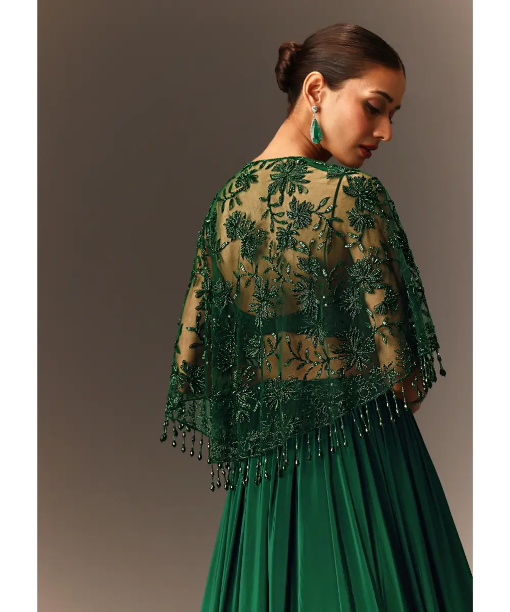 KALKI - Bottle Green Tiered Lehenga With Net Cape