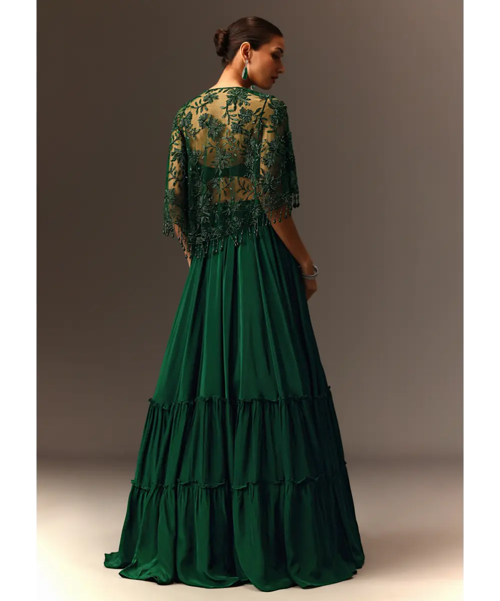 KALKI - Bottle Green Tiered Lehenga With Net Cape