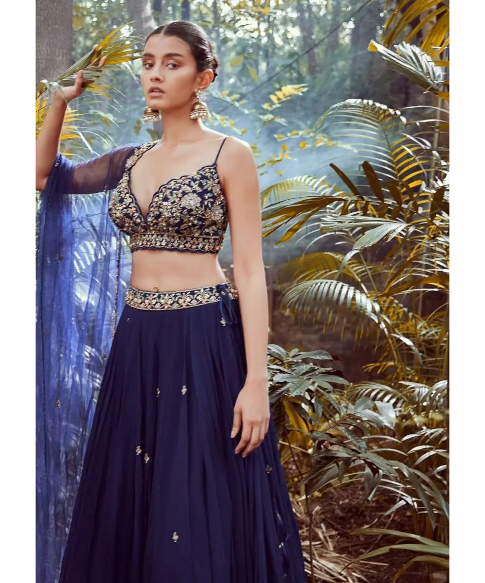 KALKI - Blue blood Lehenga Choli With Hand Embroidered Crop Top Using Sequins And Beads In Floral Jaal Design