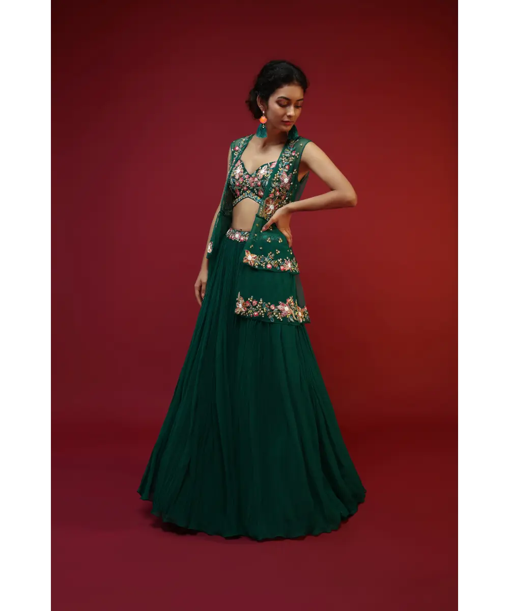 KALKI - Bottle Green Lehenga Choli And Sleeveless Peplum Jacket Adorned With Colorful Resham And Moti Embroidered Flowers