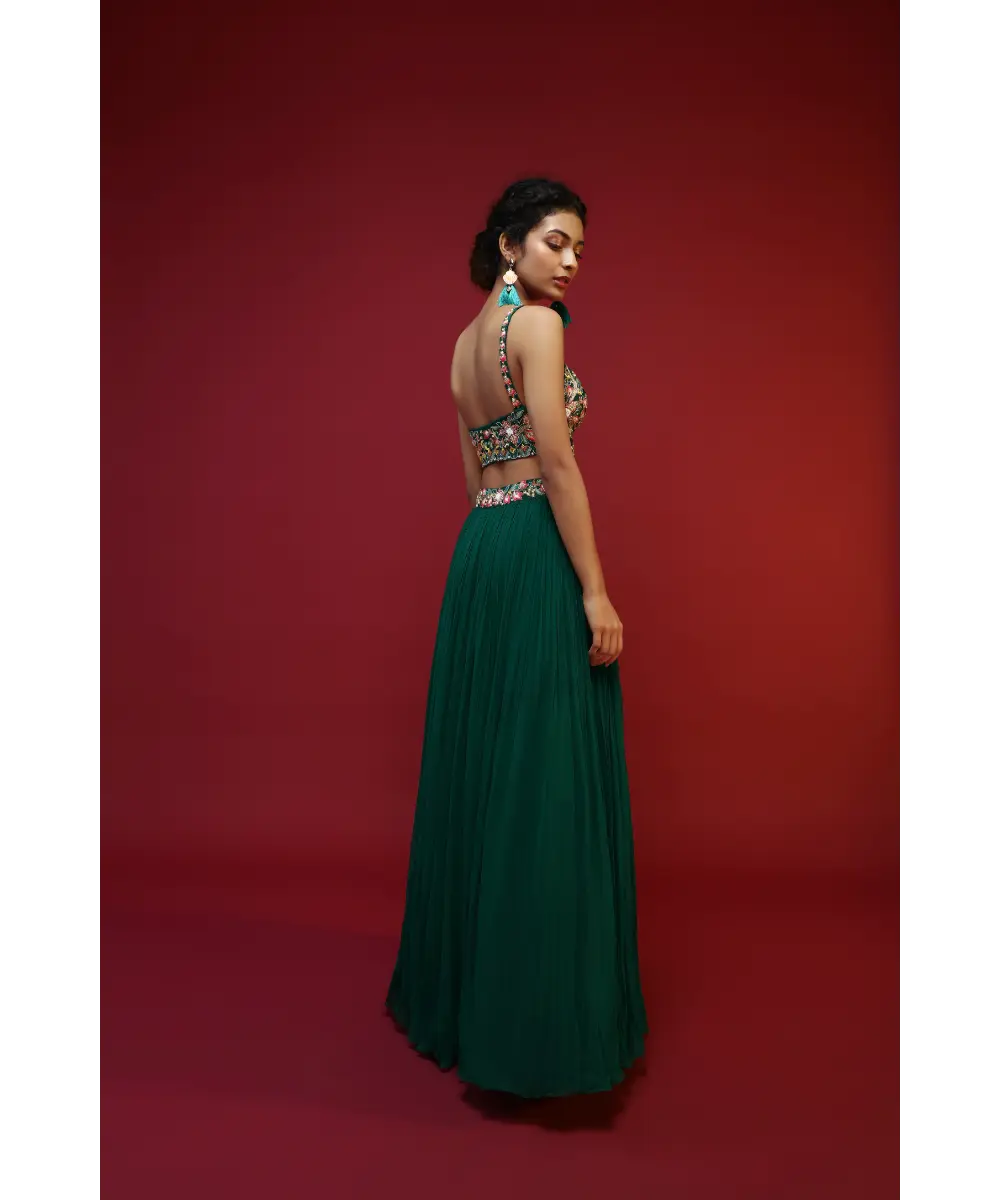 KALKI - Bottle Green Lehenga Choli And Sleeveless Peplum Jacket Adorned With Colorful Resham And Moti Embroidered Flowers